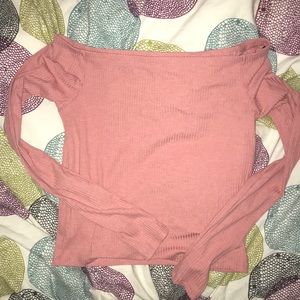 A pink long sleeved shirt.